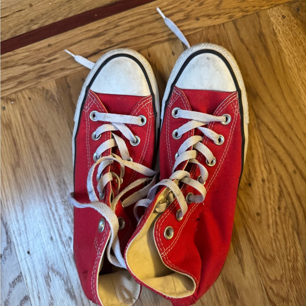 Red all star high top shoes